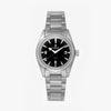 Lorier Falcon wristwatch with a stainless steel case and three-link bracelet, featuring a black dial with white Arabic numerals and hands.