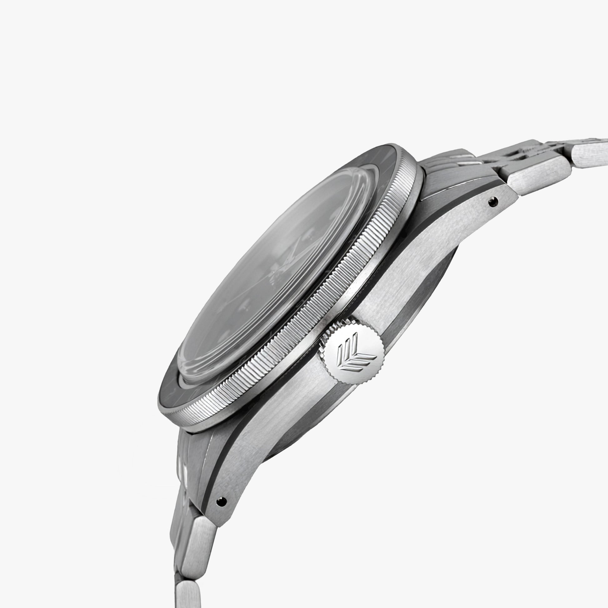 Lorier Hyperion GMT automatic watch side profile on white background, brushed steel case with knurled rotating bezel, screw-down engraved Lorier crown, and five-link bracelet.